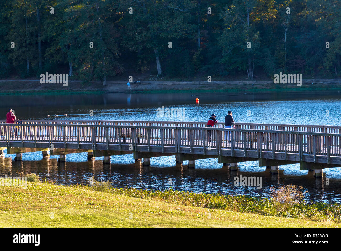 Reston, Virginia, USA--October 22, 2018. A photo of men fishing from ...
