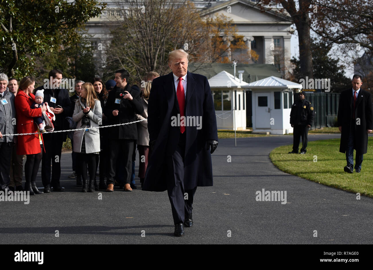 Washington, DC. 8th Dec, 2018. United States President Donald J. Trump walks towards the press while departing the White House December 8, 2018 in Washington, DC. Trump announced White House Chief of Staff John Kelly will resign by the end of the year before departing for the 119th Army-Navy Football Game in Philadelphia, Pennsylvania. Credit: Olivier Douliery/Pool via CNP | usage worldwide Credit: dpa/Alamy Live News Stock Photo