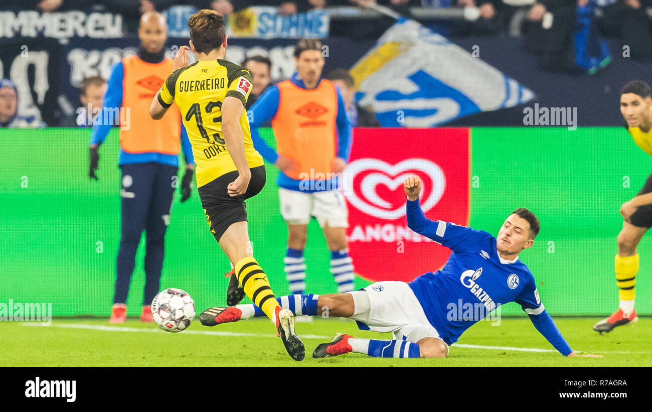 Gelsenkirchen, Germany 08 december 2018 Soccer Bundesliga: Schalke 04 v Borussia Dortmund   l+r Raphael Guerreiro Borussia Dortmund and Hamza Mendyl (Schalke 04) Stock Photo