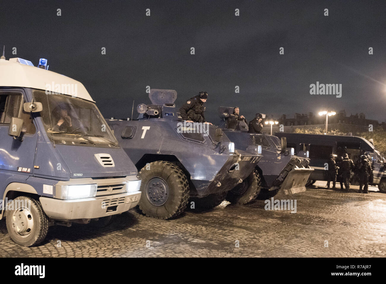 Yellow vests - Avenue des Champs-Elysees in Paris December 8, 2018 - The police use the armored gendarmerie. Stock Photo