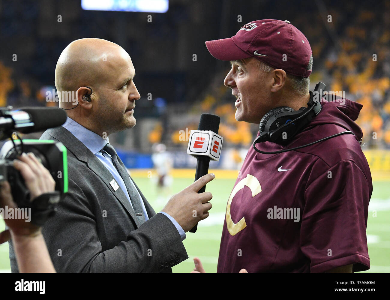 December 8, 2018: Colgate Raiders head coach Dan Hunt in interviewed by an ESPN reporter before a NCAA FCS playoff quarter final football game between the Colgate University Raiders and the North Dakota State Bison at the Fargo Dome, Fargo, North Dakota. North Dakota State defeated Colgate 35-0. Photo by Russell Hons Stock Photo