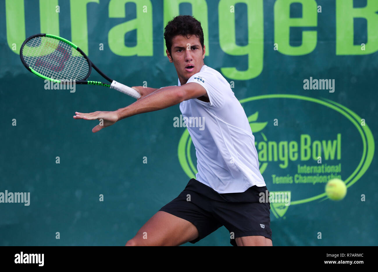 Plantation, Florida, USA. 08th Dec, 2018. Mateus Alves, from Brazil, plays  in the BS18 semifinal of the 2018 Orange Bowl Junior International Tennis  Championships played at the Frank Veltri Tennis Center in
