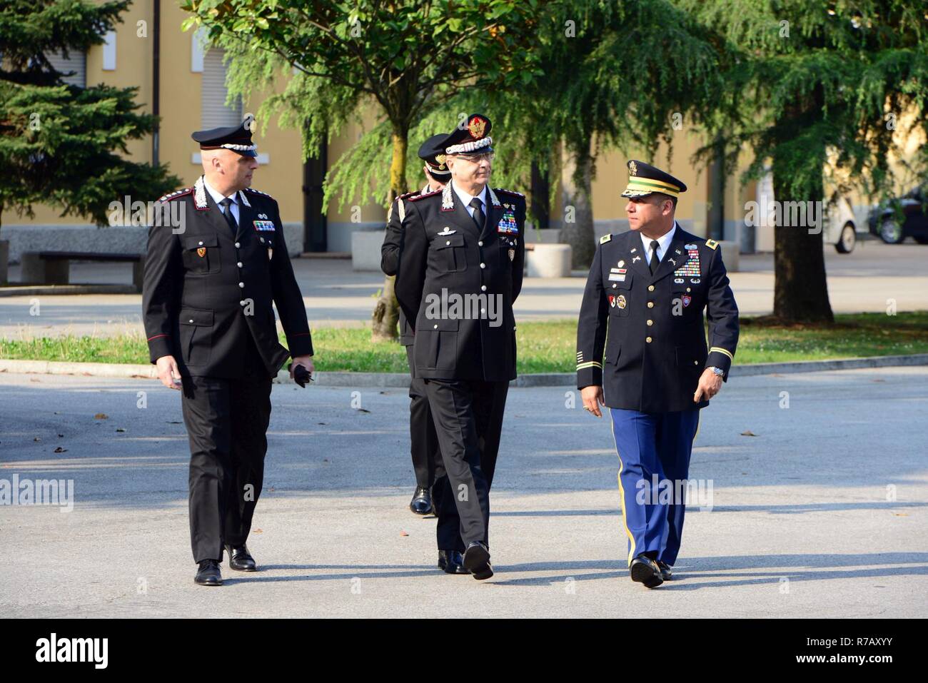 U.S. Army Col. Darius S. Gallegos (right), Center of Excellence for Stability Police Units (CoESPU) deputy director, Lt. Gen Vincenzo Coppola (center), deputy commander of the Carabinieri Corps and  Italian Carabinieri Col Nicola Mangialavori (left), Chief of Special Branch Department, during the visit NATO JFC-Naples Commander, Admiral Michelle Howard at the CoESPU Vicenza, April 10, 2017. Stock Photo