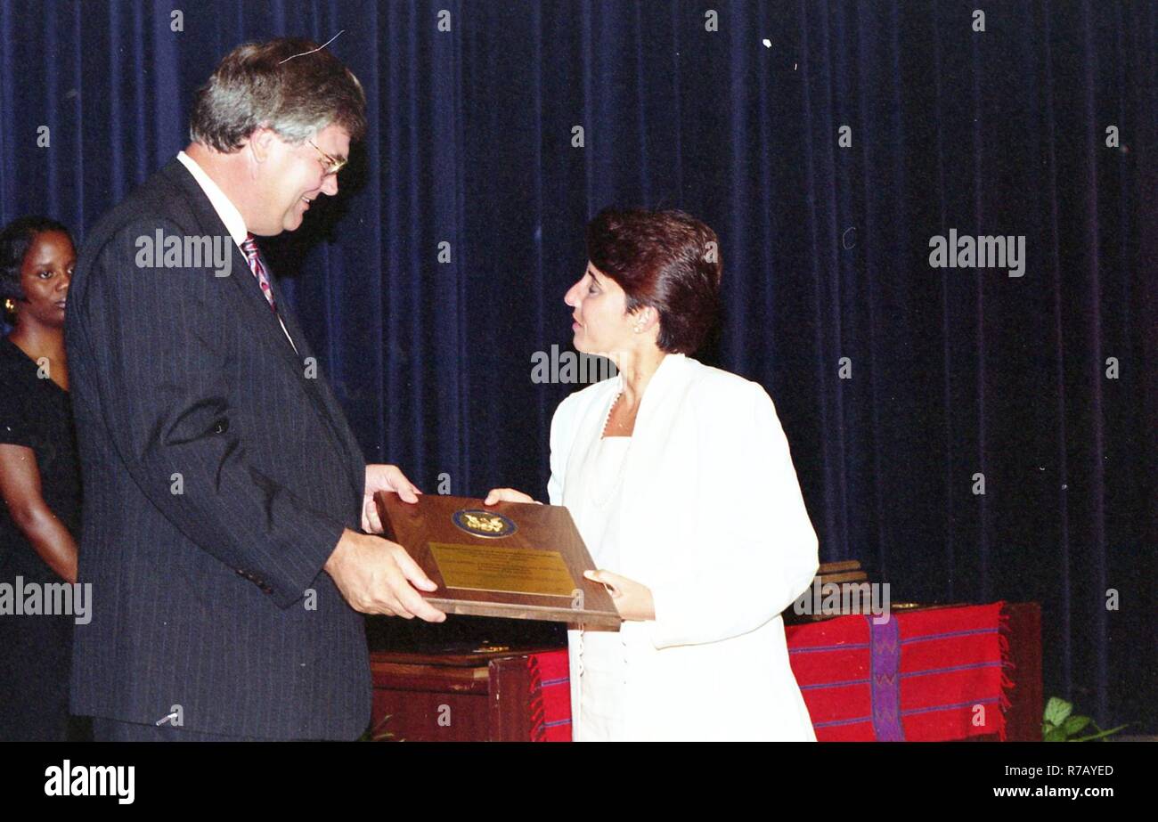 Admin. Atwood contact sheet CFC; Health Fair Woman receiving award