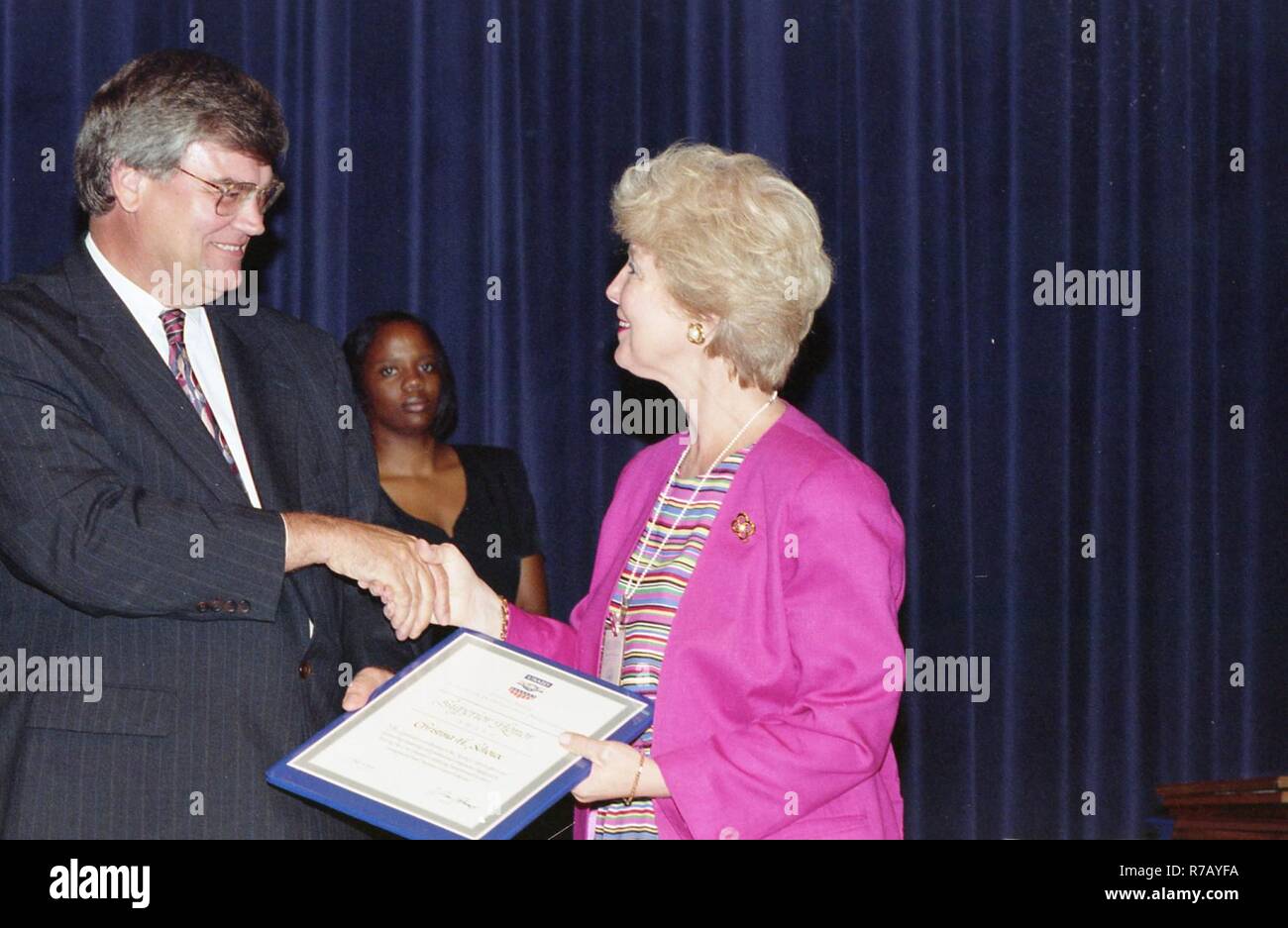 Admin. Atwood contact sheet CFC; Health Fair Woman receiving award