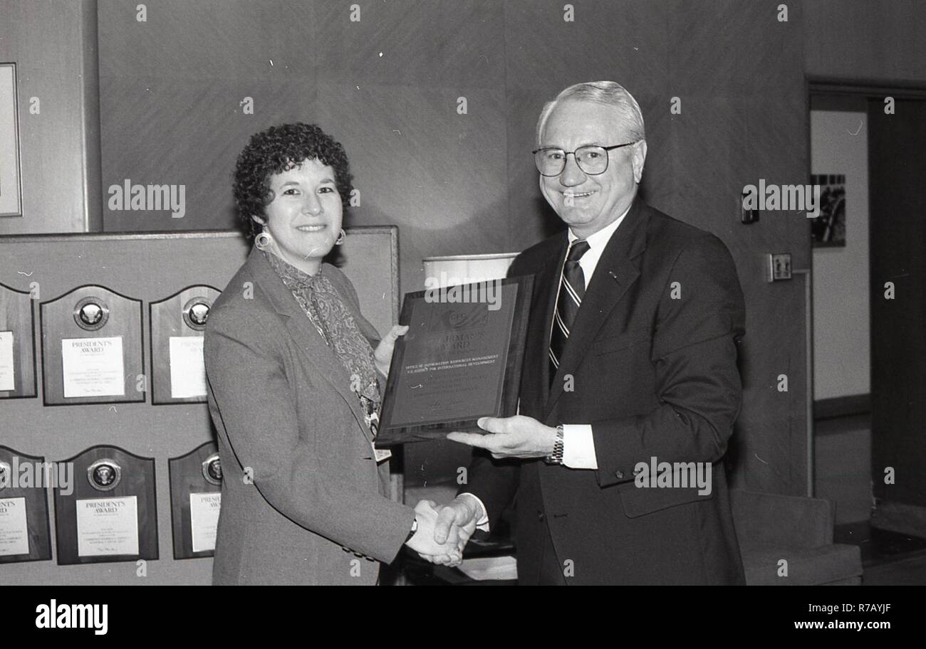 Admin. Atwood contact sheet CFC; Health Fair Woman receiving Award