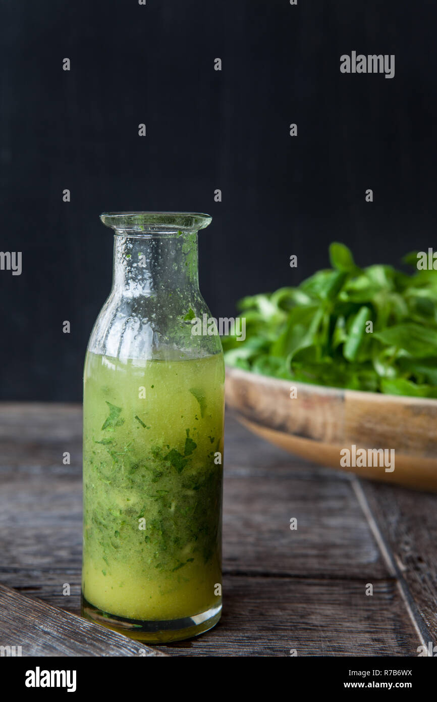 small bottle with salad dressing Stock Photo