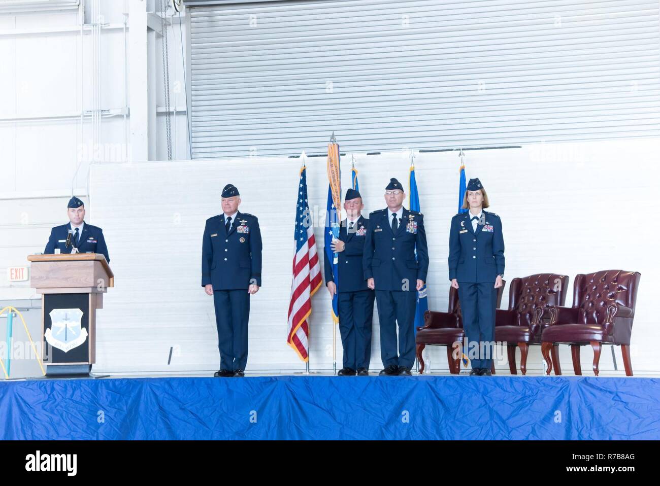 Members of the official party stand at attention during the 403rd Wing ...