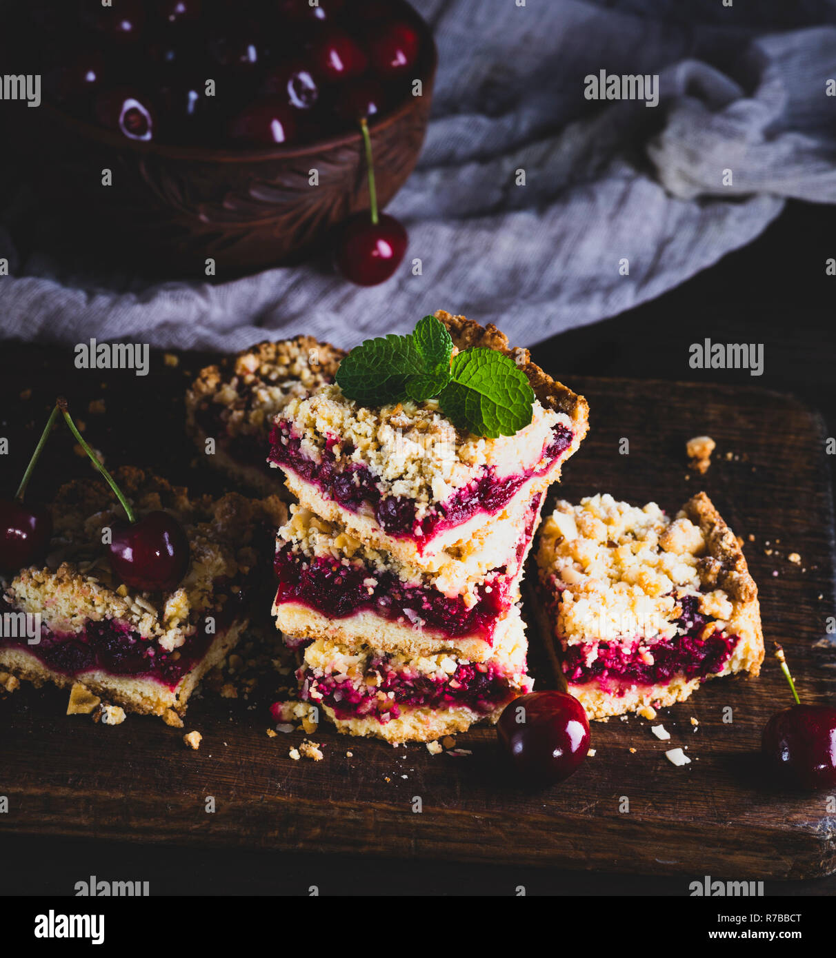 pile of baked cake with cherry Stock Photo