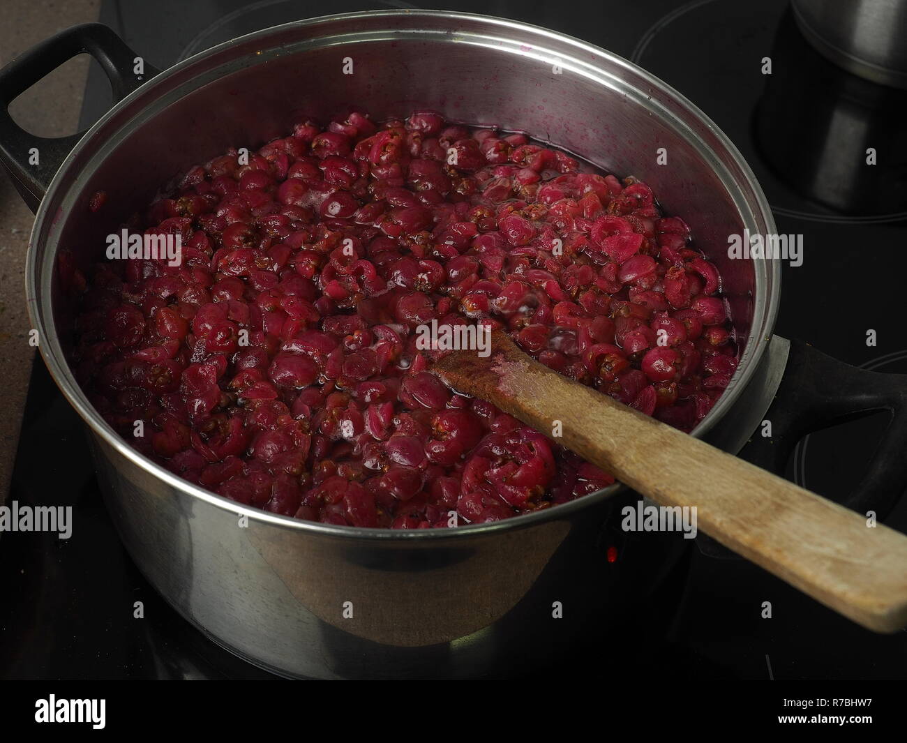 Australian bushtucker Lilly Pilly fruit being made into Lilly Pilly jam. An Australian native wild fruit that is edible and beautiful. Stock Photo