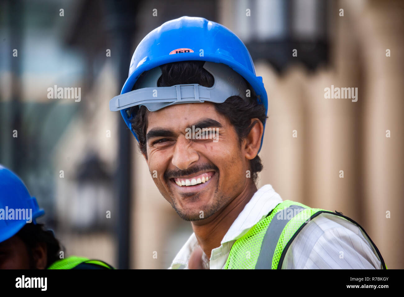 Construction Worker wearing a Hard Hat Safety helmet on a construction