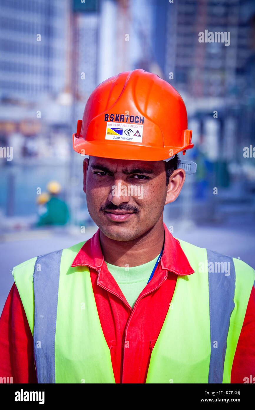 Construction Worker wearing a Hard Hat Safety helmet on a construction