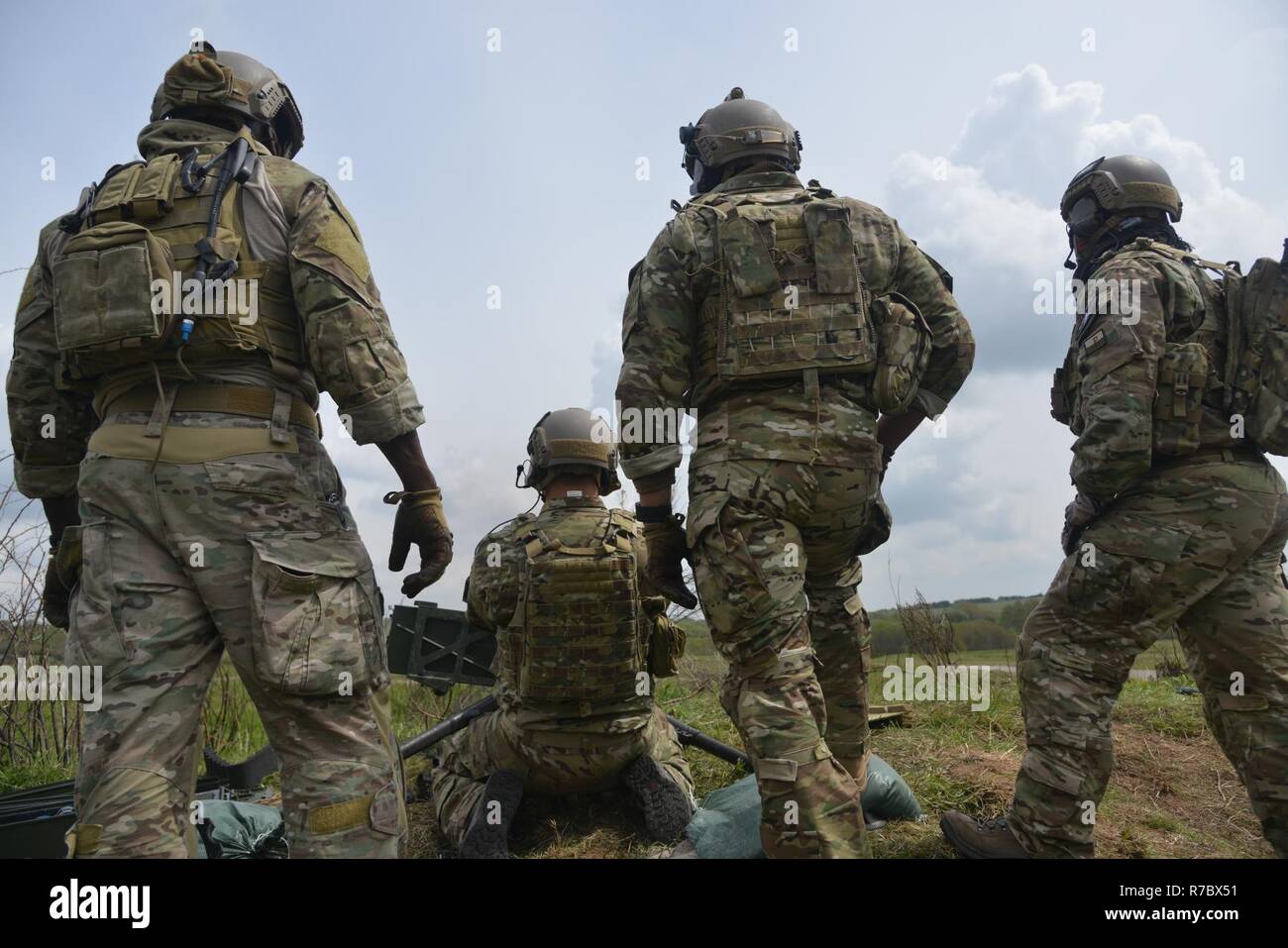 U.S. Soldiers assigned to 1-10th Special Forces Group firing .50 cal ...