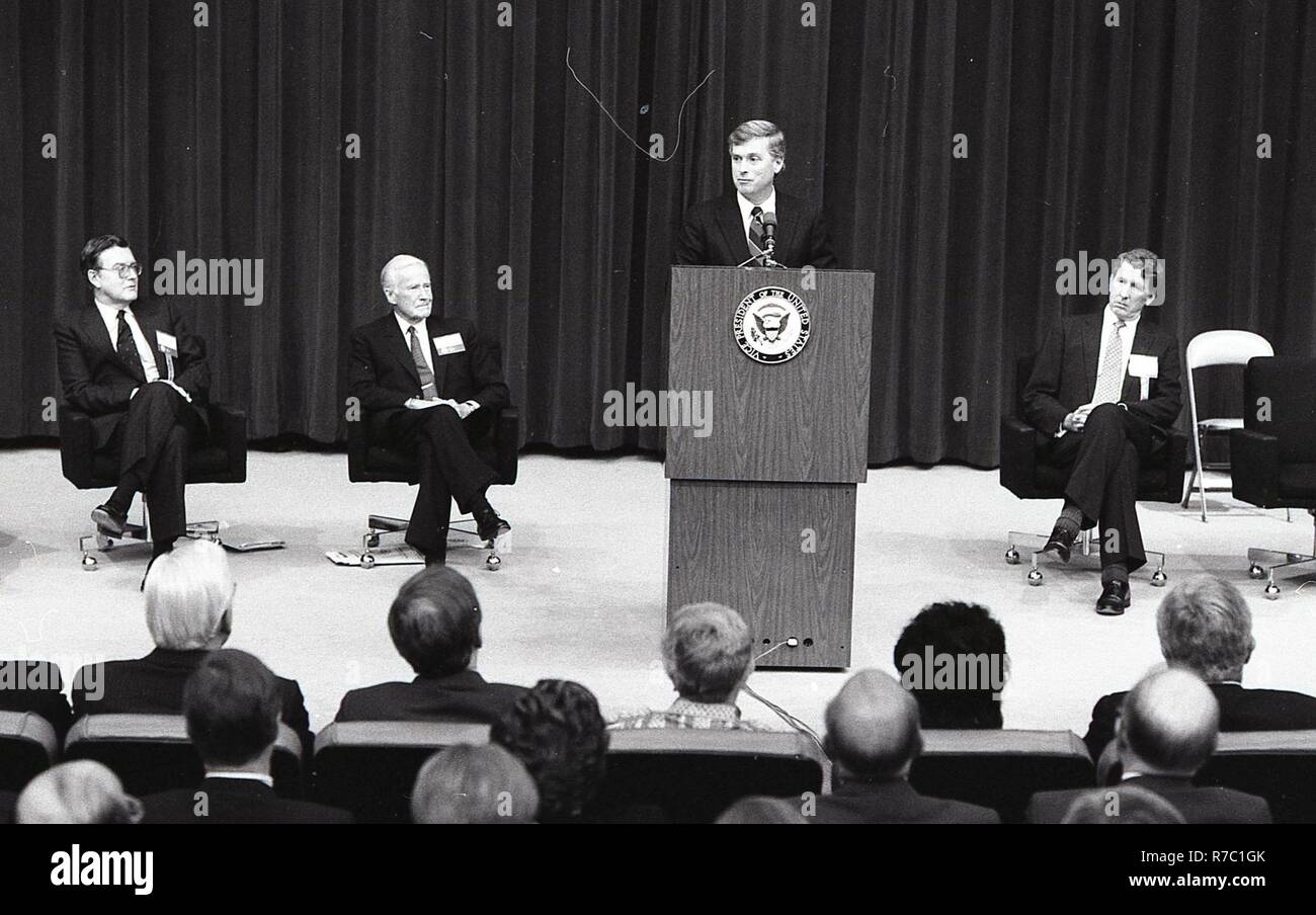 THERE IS A MAN AT THE PODIUM GIVING A SPEECH TO A GROUP OF MEN AND ...