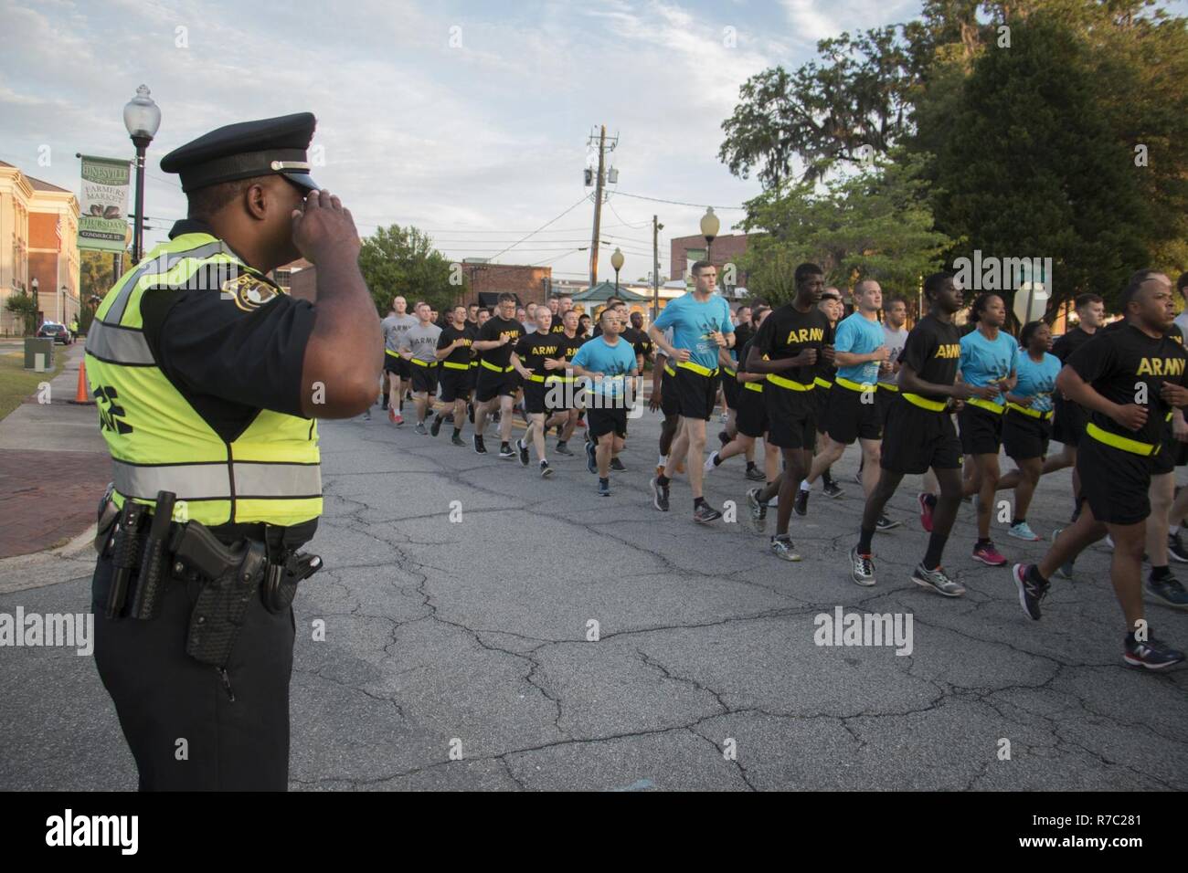 A Hinesville, Ga. police officer salutes local law enforcement and
