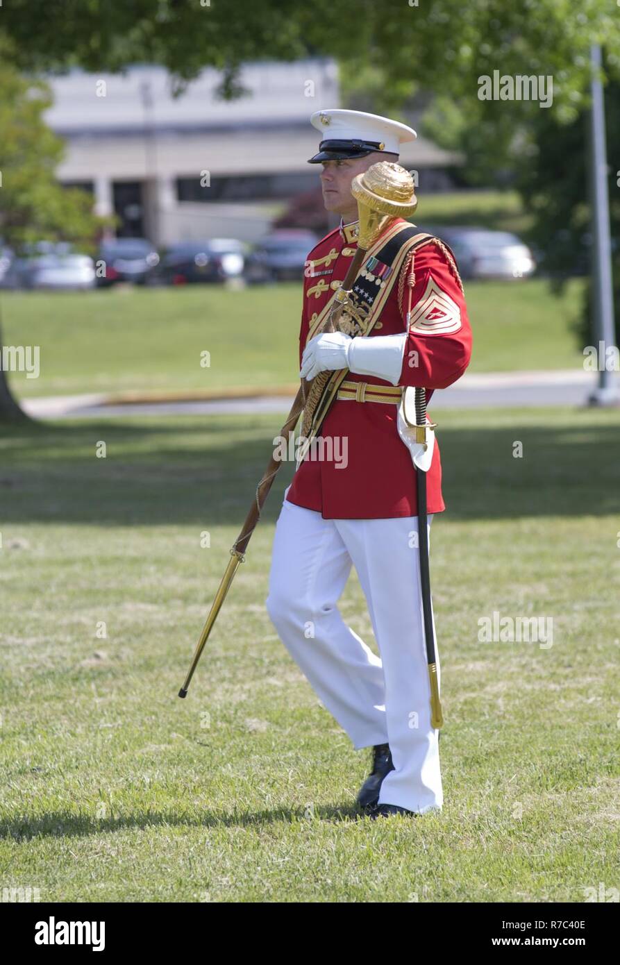 U.S. Marine Corps Master Sgt. Keith G. Martinez, drum major for the U.S. Marine Drum and Bugle Corps, marches during the Centennial Celebration Ceremony at Lejeune Field, Marine Corps Base Quantico (MCBQ), Va., May 10, 2017. The event commemorates the founding of MCBQ in 1917, and consisted of performances by the U.S. Marine Corps Silent Drill Platoon and the U.S. Marine Drum & Bugle Corps. Stock Photo
