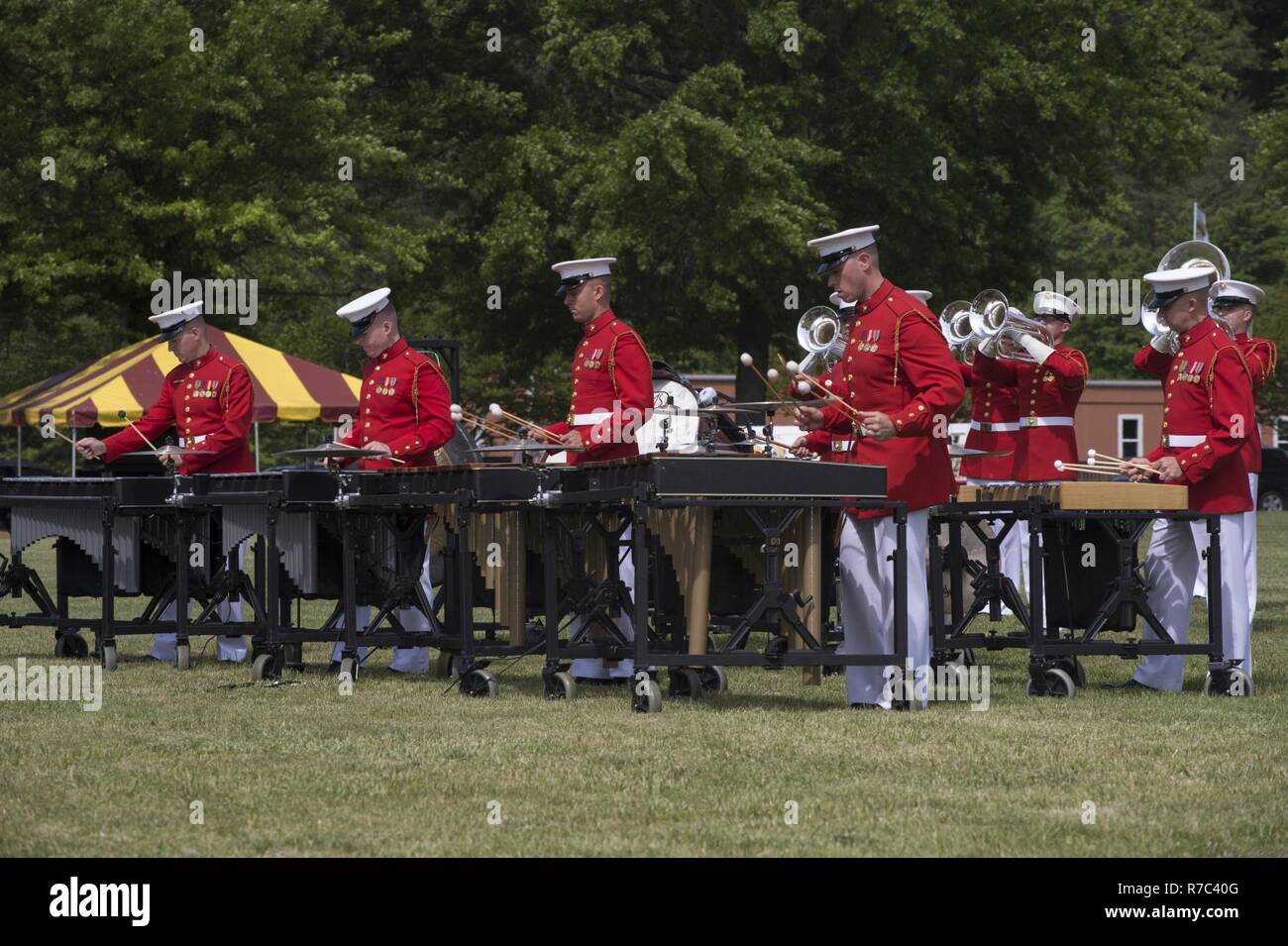 The U.S. Marine Drum and Bugle Corps perform during the Centennial Celebration Ceremony at