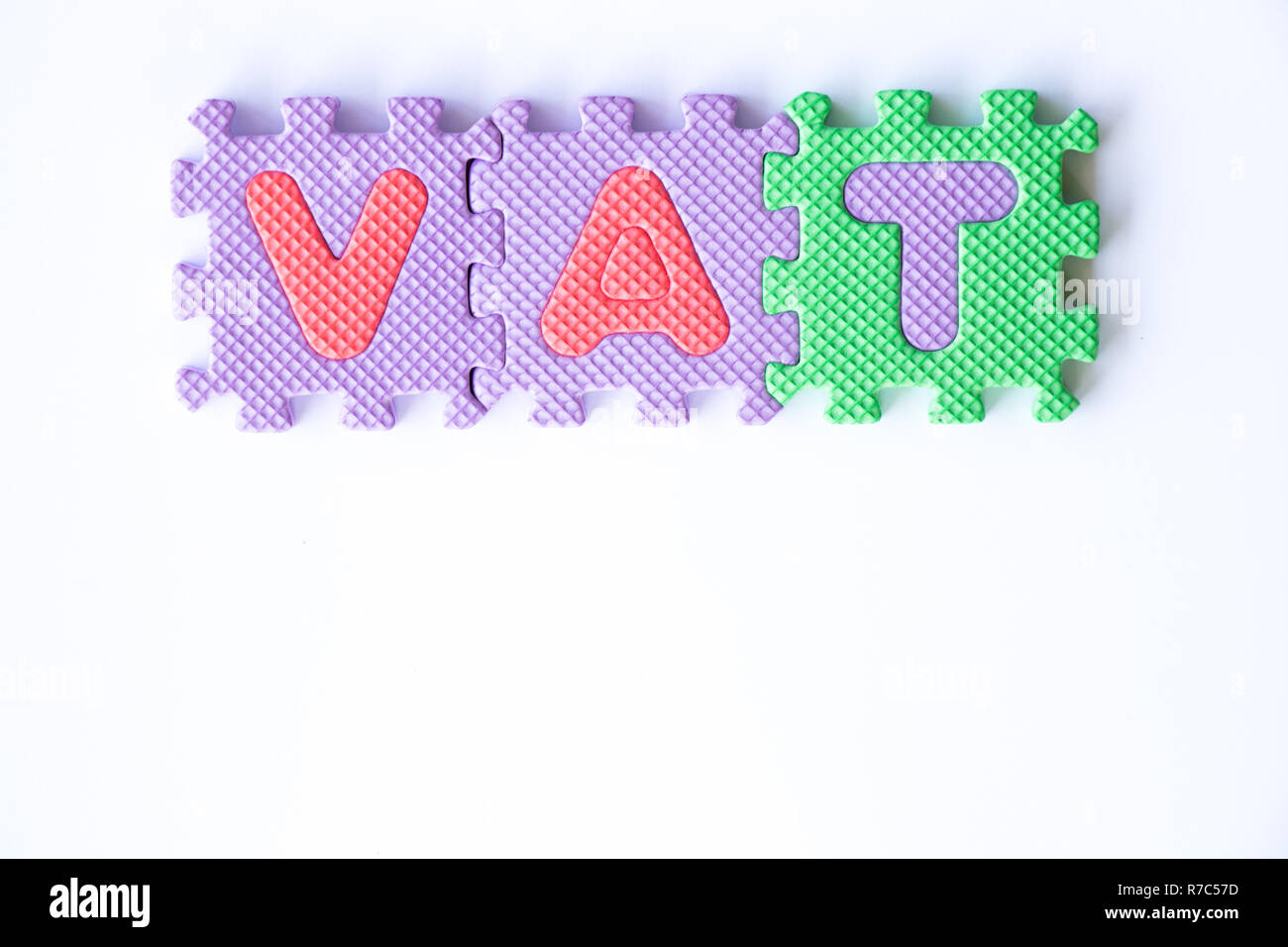 Color toy foam alphabet in word VAT (Abberviation of Value added tax