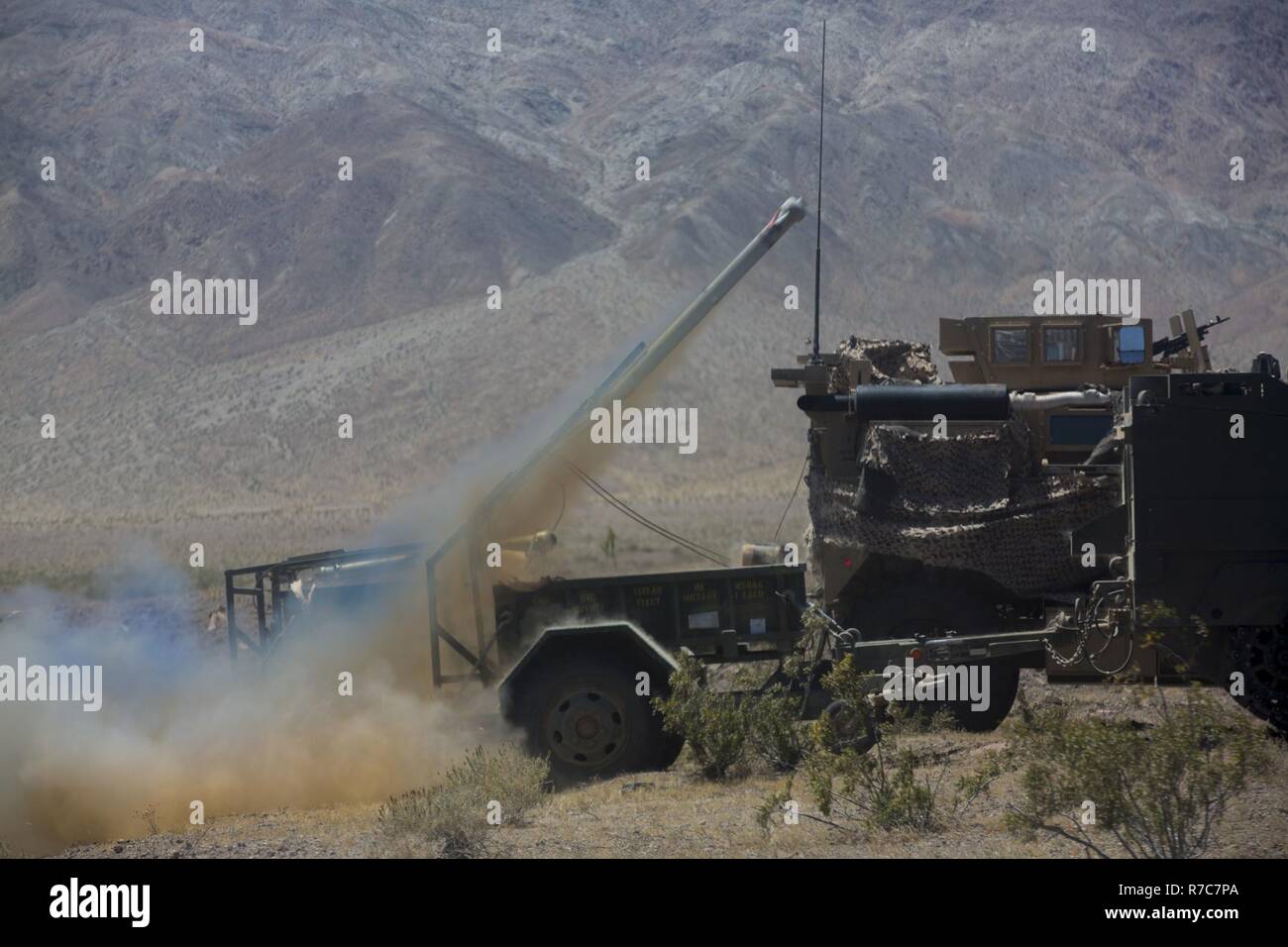 A line charge is projected in the air at Marine Corps Air-Ground Combat ...