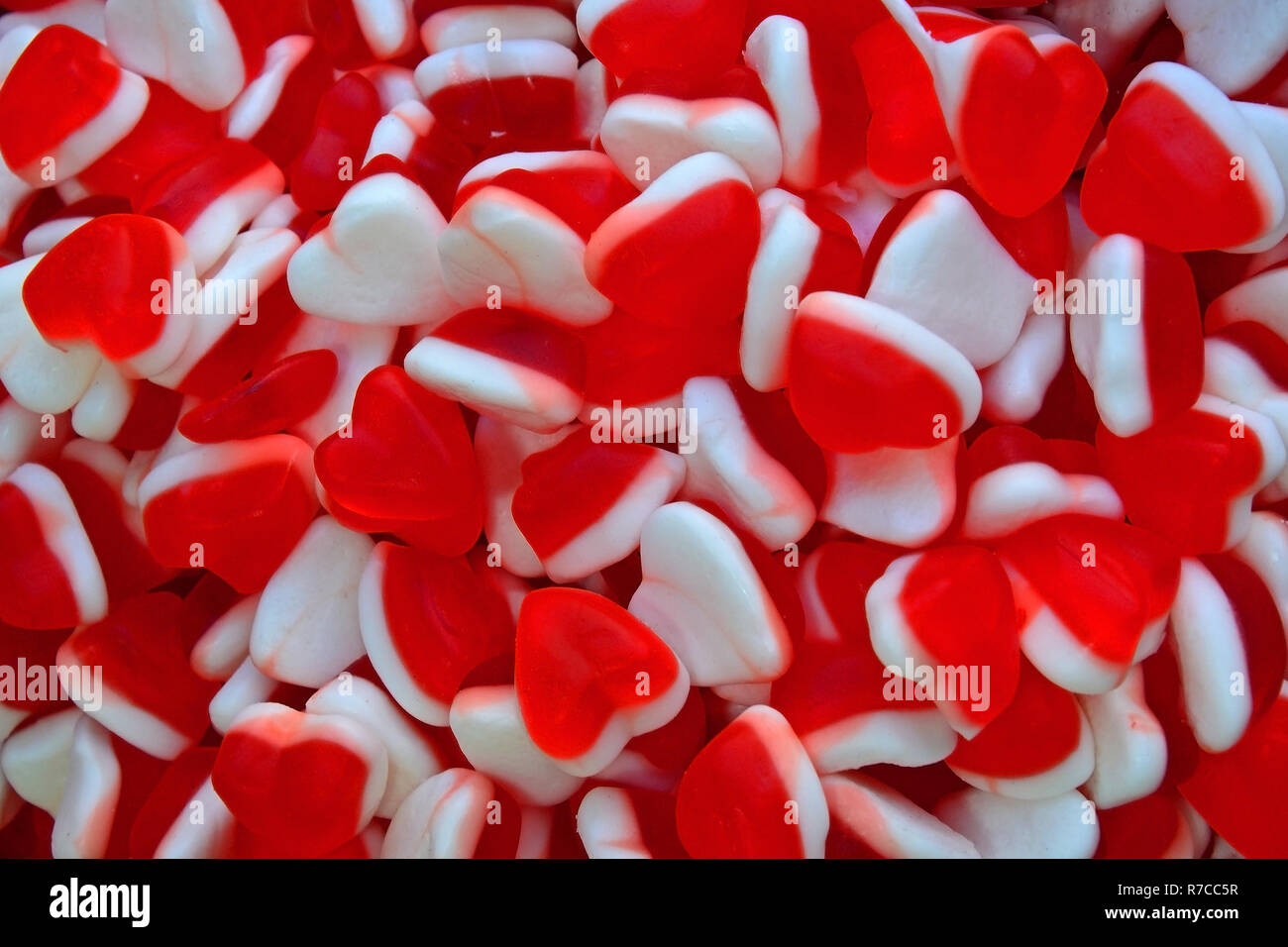 Jelly Candies In The Form Of Heart Red And White Background Of