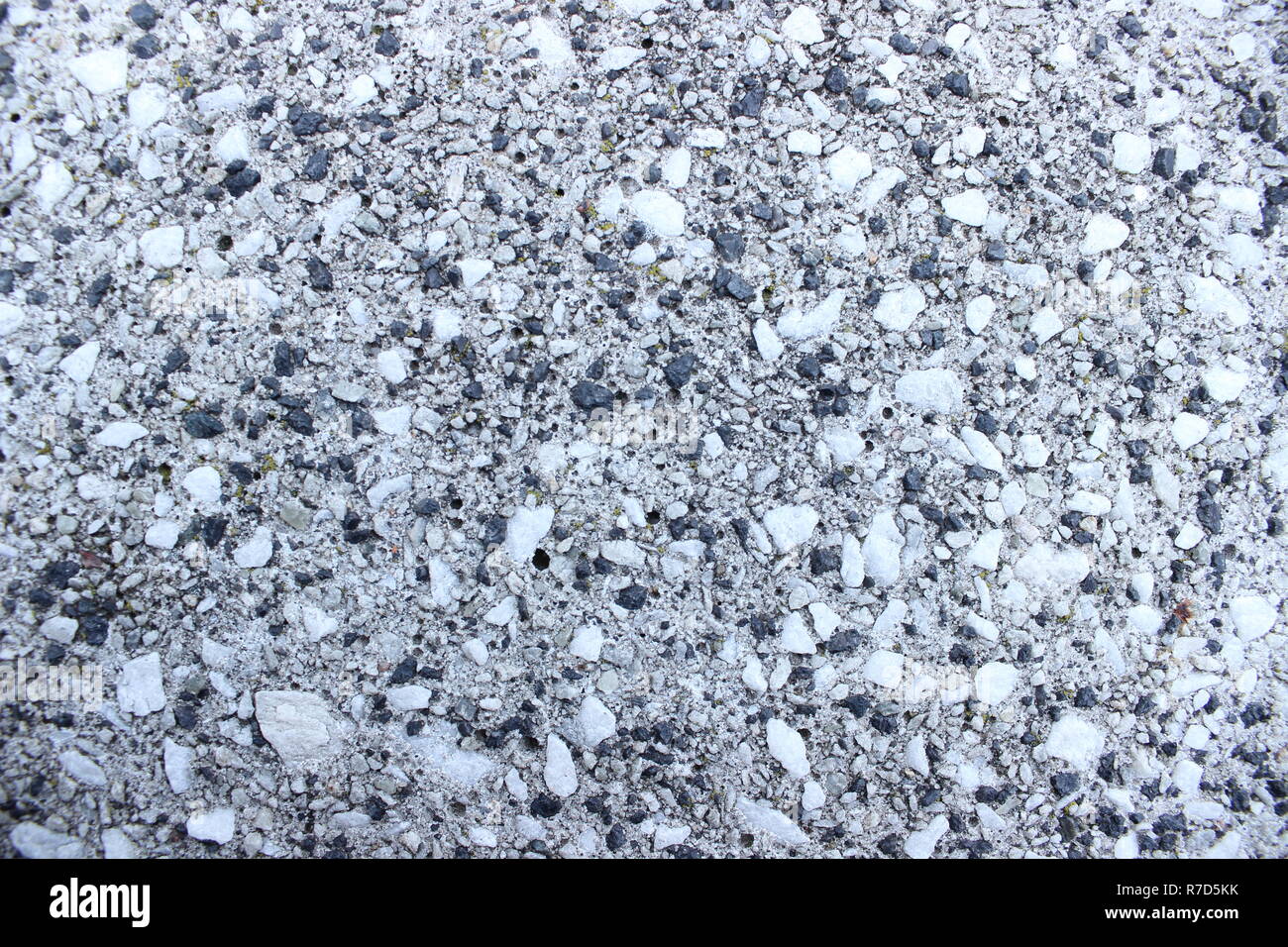 Rock ground texture; good representation of a sidewalk or gravel, industrial areas, cityscapes Stock Photo