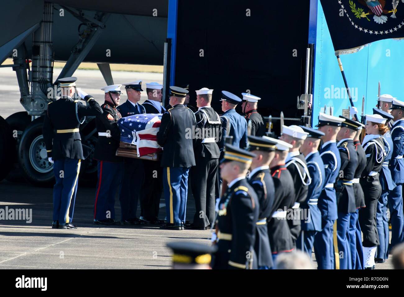 U.S. service members of the joint forces honor guard provide military honors during the departure of former President George H. W. Bush, the 41st President of the United States, from Ellington Field Joint Reserve Base, Texas Dec. 03, 2018. Nearly 4,000 military and civilian personnel from across all branches of the U.S. armed forces, including Reserve and National Guard components, provided ceremonial support during George H. W. Bush’s, the 41st President of the United States state funeral. (Air National Guard Stock Photo
