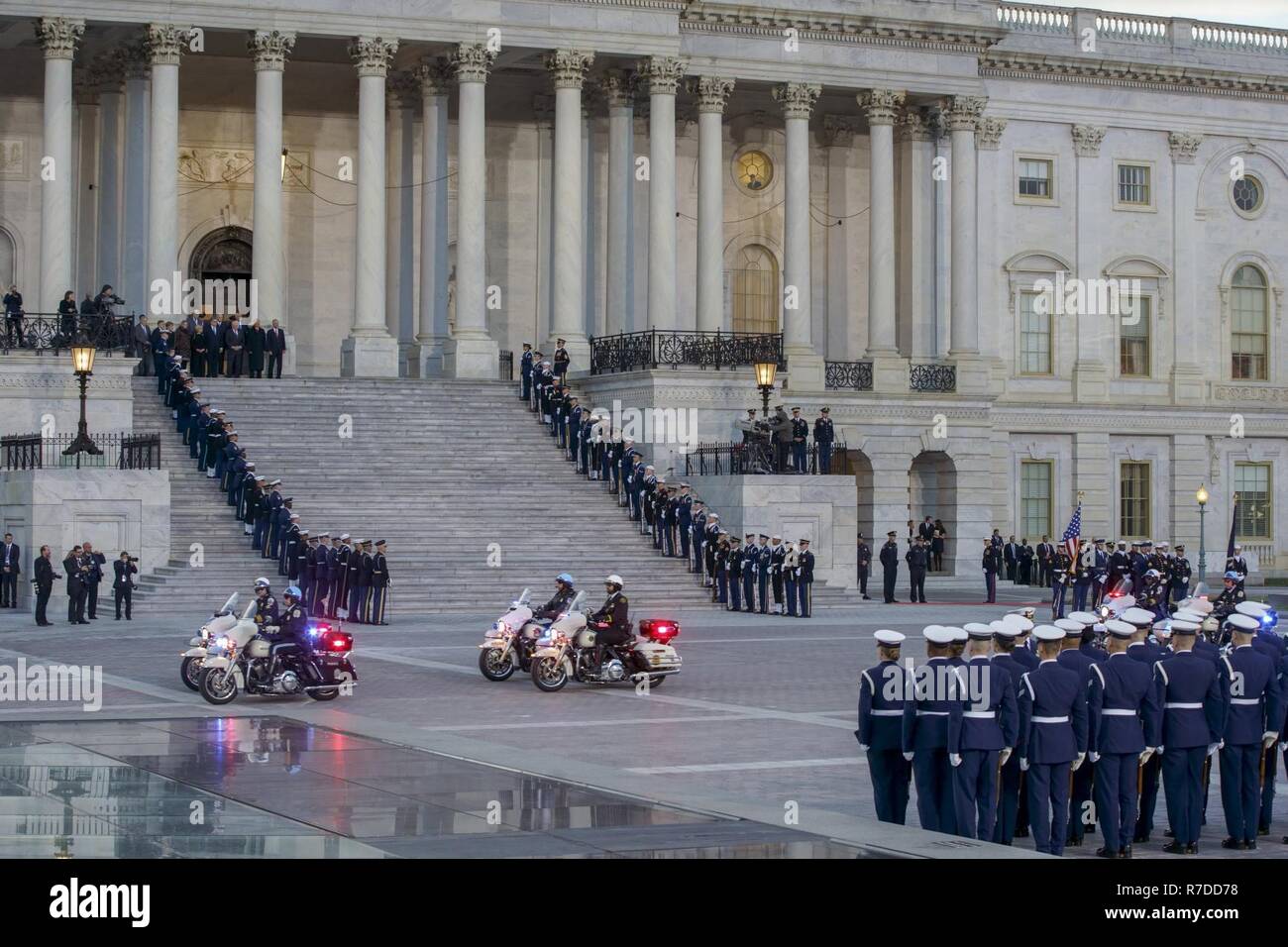 U.S. Capitol Police escort the hearse carrying the casket of George H.W. Bush, 41st President of the United States, to the United States Capitol, Washington, D.C., Dec. 3, 2018. Nearly 4,000 military and civilian personnel from across all branches of the U.S. armed forces, including Reserve and National Guard Components, provided ceremonial support during George H.W. Bush’s, the 41st President of the United States state funeral. (DoD Stock Photo