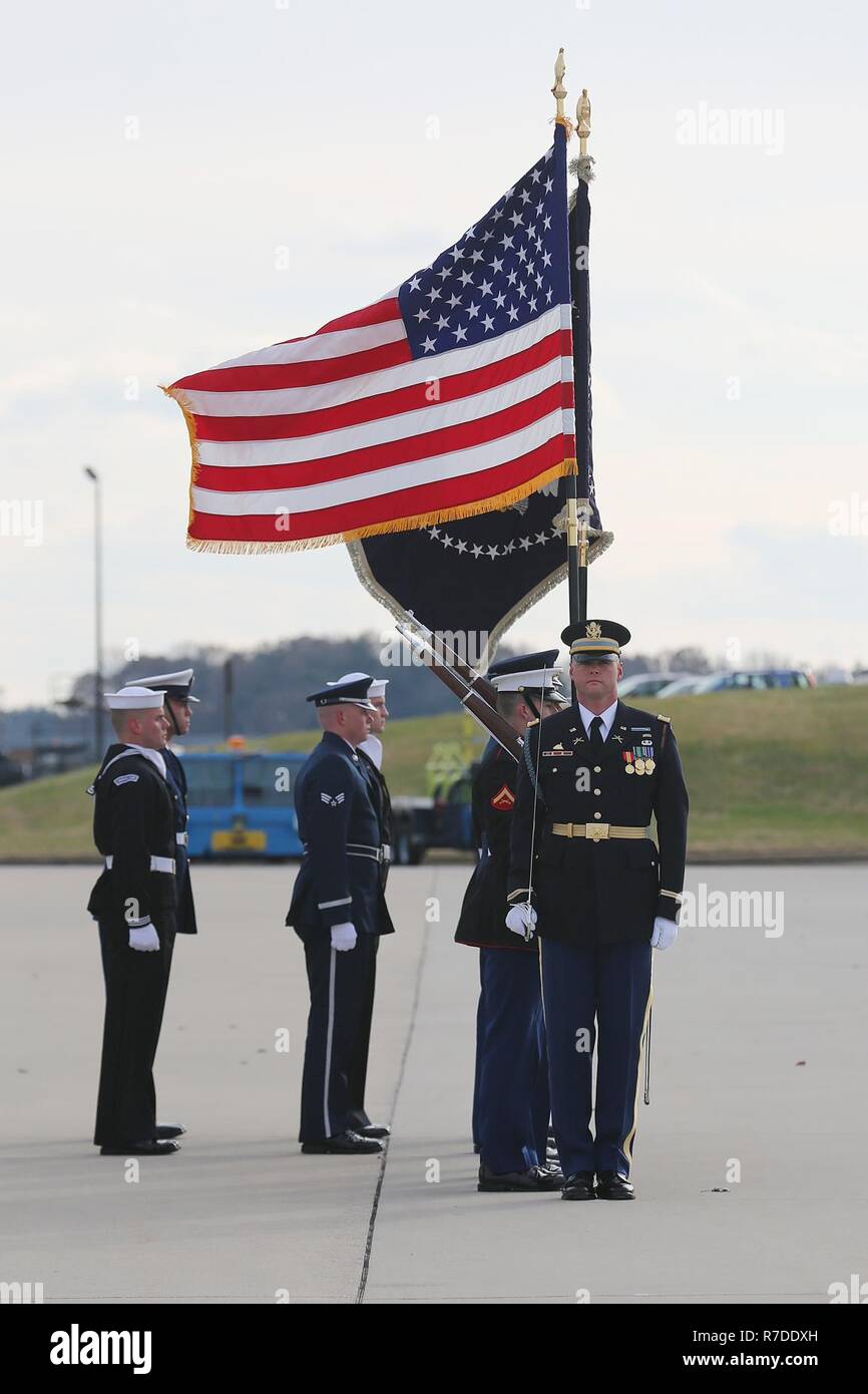 U.S. service members with the Ceremonial Honor Guard renders honors, Andrews Air Base, Maryland, Dec. 05, 2018. Nearly 4,000 military and civilian personnel from across all branches of the U.S. armed forces, including Reserve and National Guard components, provided ceremonial support during the state funeral of George H.W. Bush, the 41st President of the United States. (DoD Stock Photo