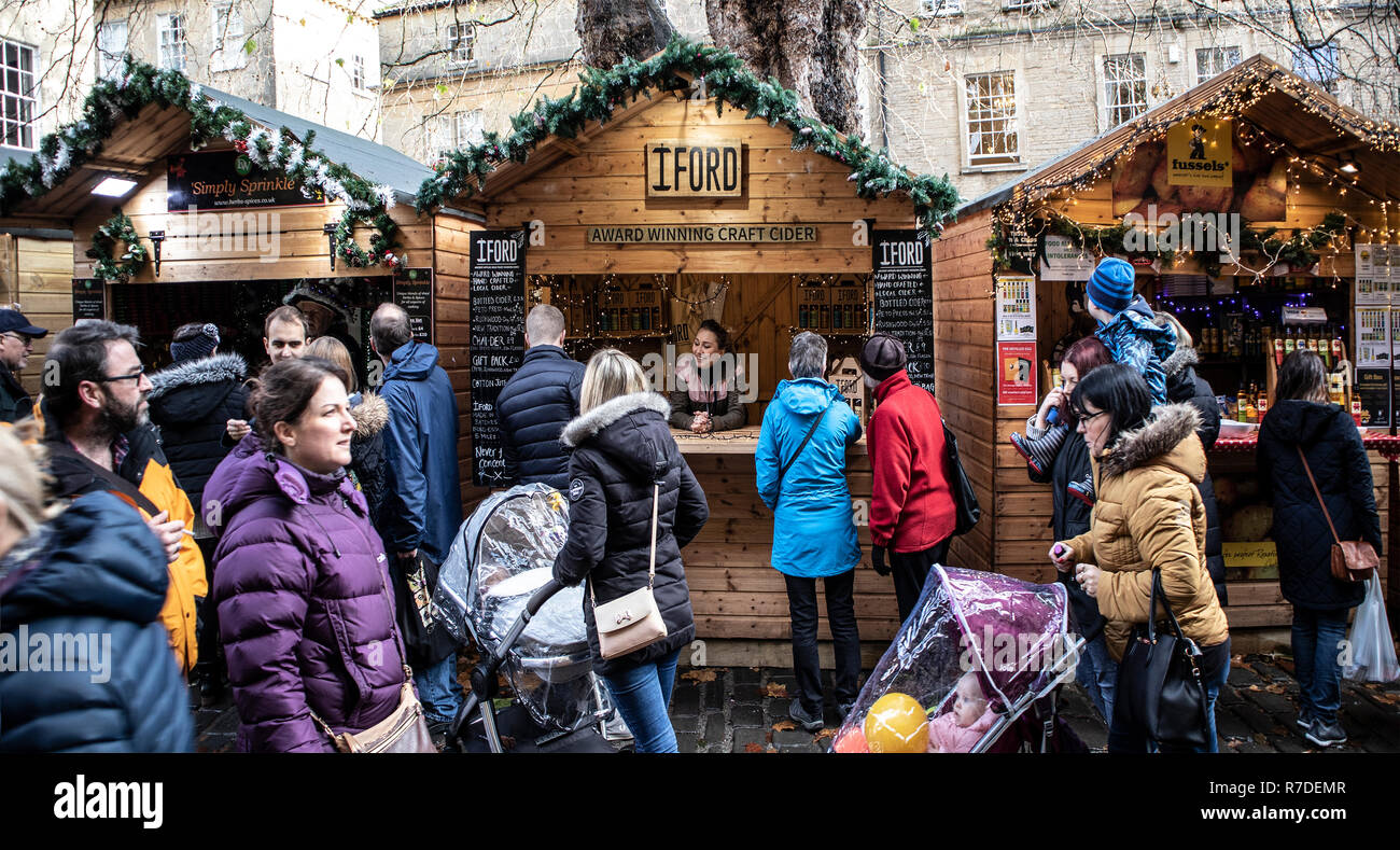 BATH, UK - NOVEMBER 29, 2018: People shopping at Bath Christmas Market. Stock Photo
