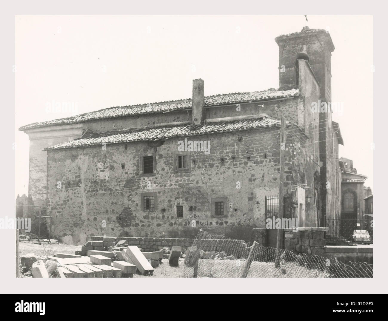 Lazio Viterbo Vejano Chiesa dell'Assunta, this is my Italy, the italian country of visual history, Exterior views of Renaissance/Baroque church before and after 1983 restoration, including views of flank, apse, portals, facade, and bell tower. Interior views of nave, chapels, architectural details and paintings. Stock Photo