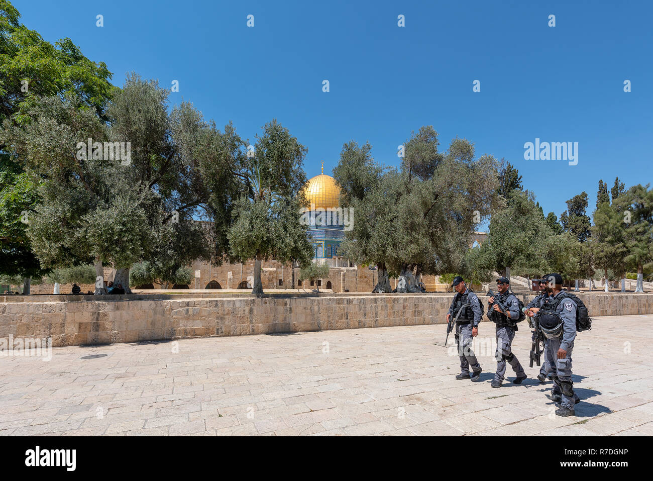 East Jerusalem, Israel - September 11, 2020: Israeli security forces walking by the dome of the rock heavily armoured Stock Photo