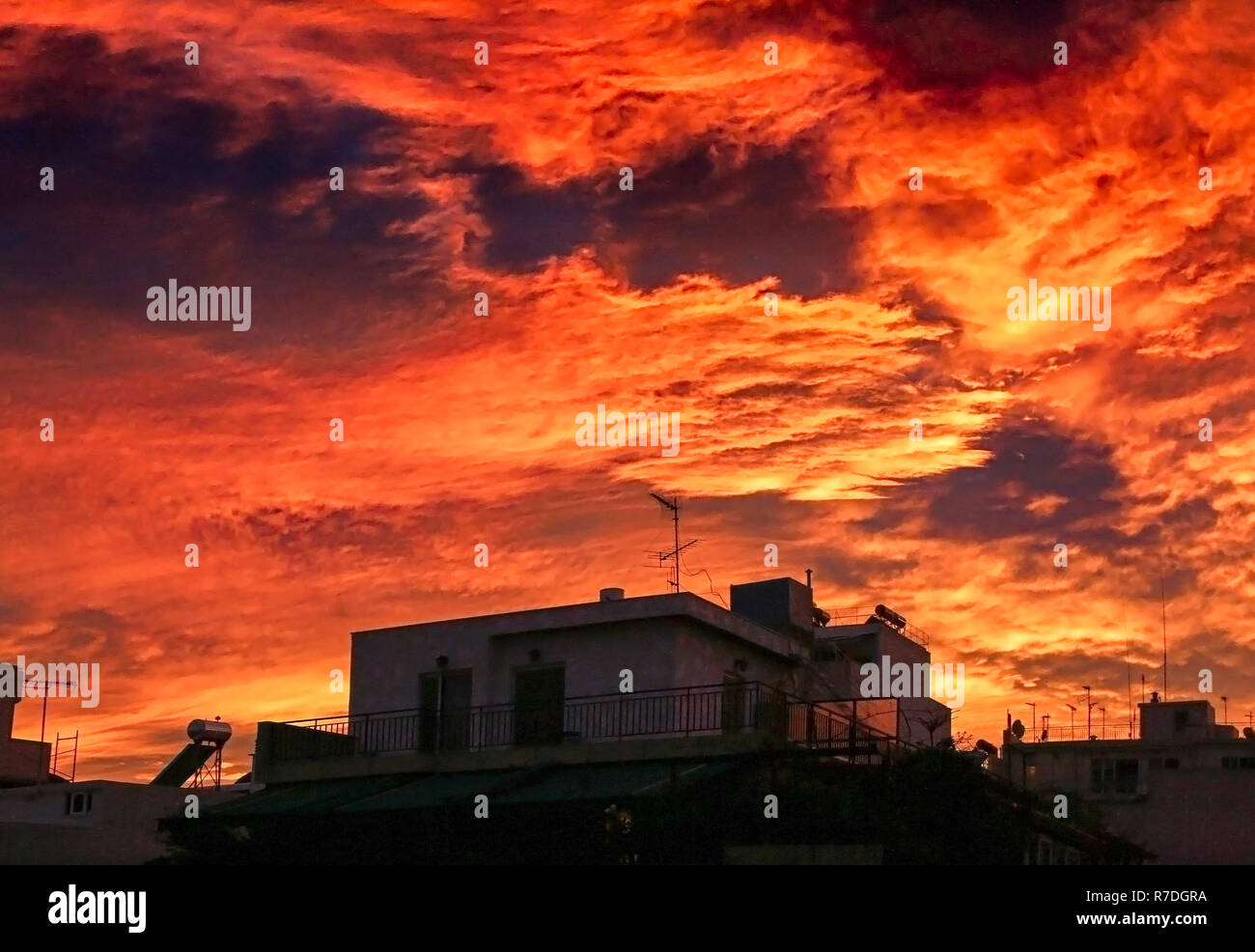 A very dramatic red sky over the city. Stock Photo