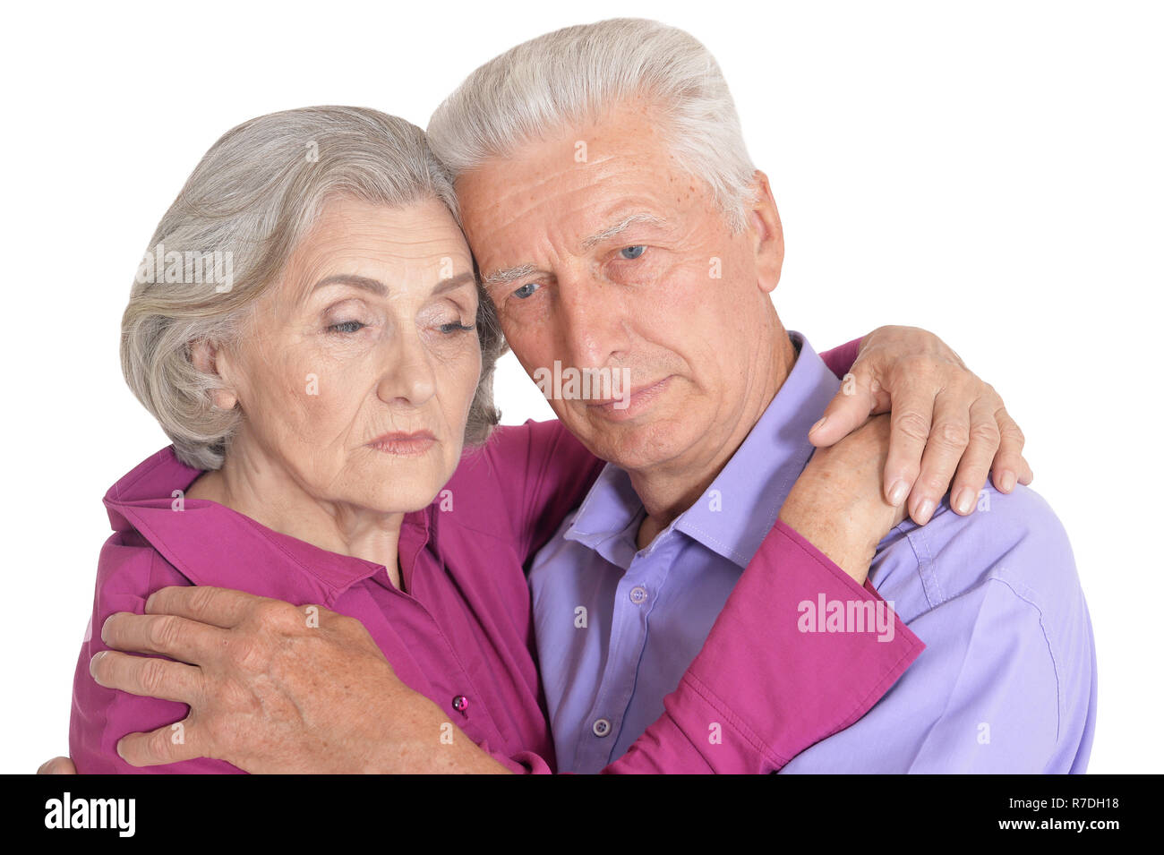 Sad senior couple isolated on white background Stock Photo
