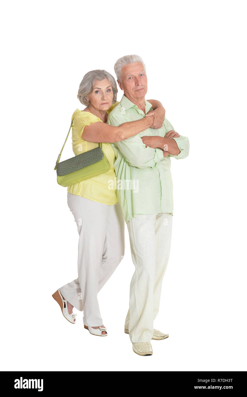 Portrait of happy senior couple posing on white background Stock Photo