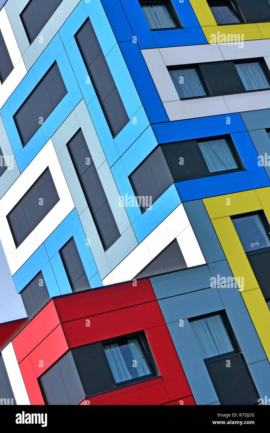 Abstract building architecture using colour shapes on colourful modern student accommodation architectural geometric pattern corner detail England UK Stock Photo