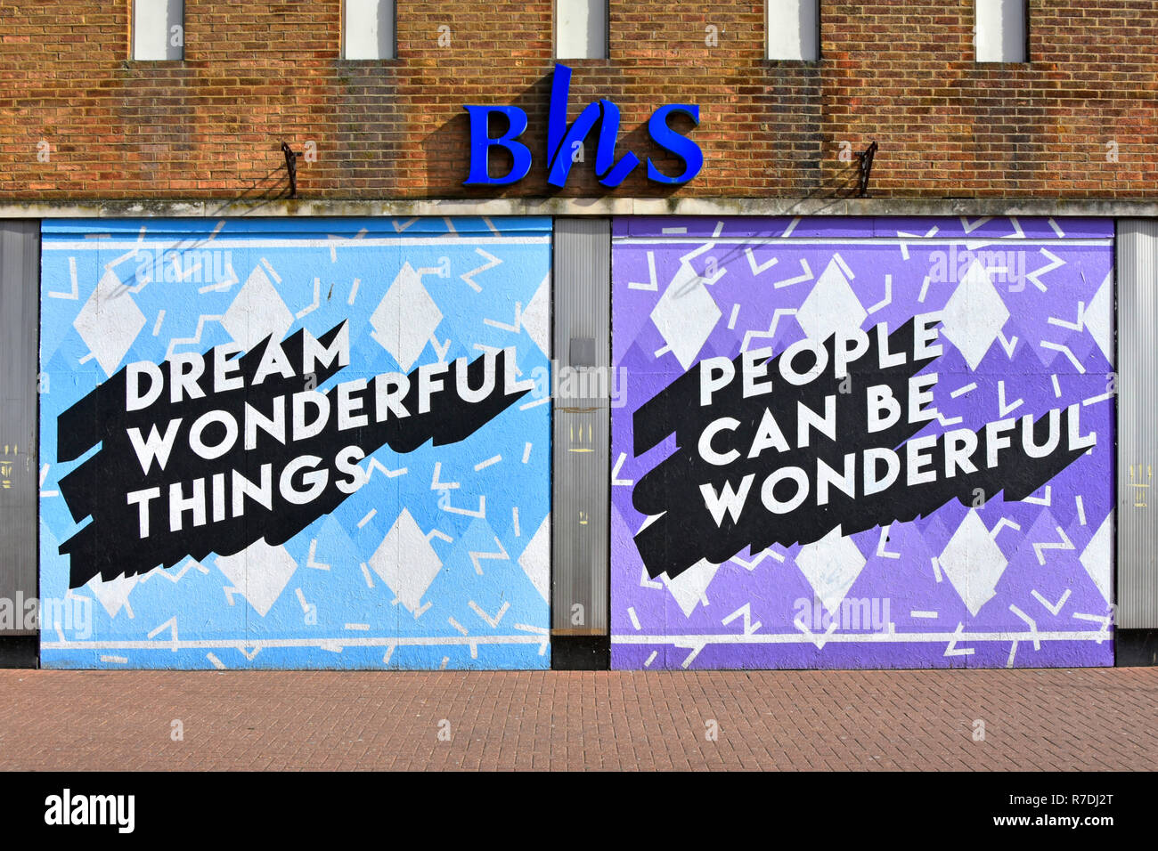 British Home Stores shop front window painted hoarding below iconic BHS store logo sign after business failure & entered administration Southend UK Stock Photo
