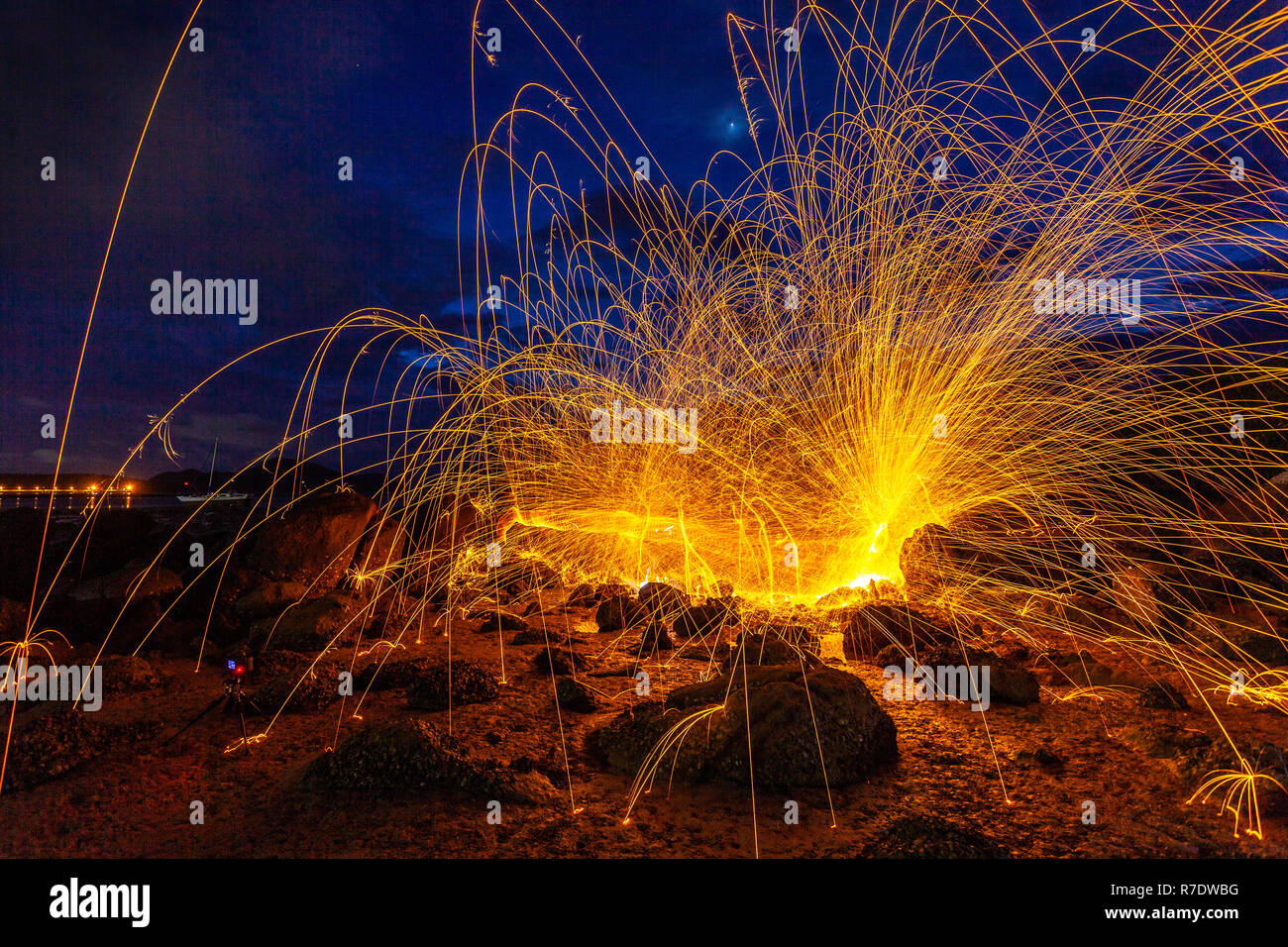 cool burning steel wool fire work photo experiments on the rock at