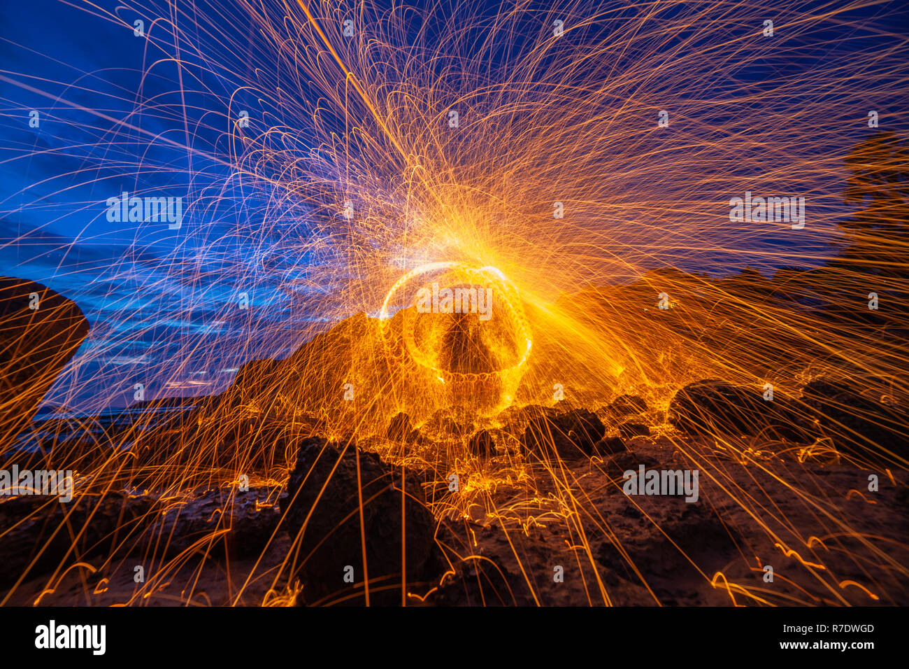 cool burning steel wool fire work photo experiments on the rock at