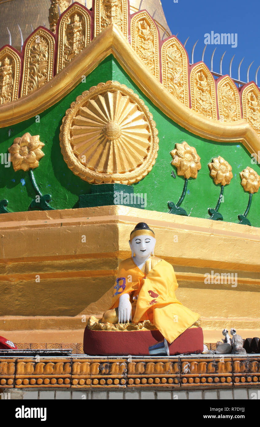 Old stone statue of meditating Buddha, Shwemawdaw Paya temple (Golden Temple), Bago, Bago Region, Myanmar (Burma) Stock Photo