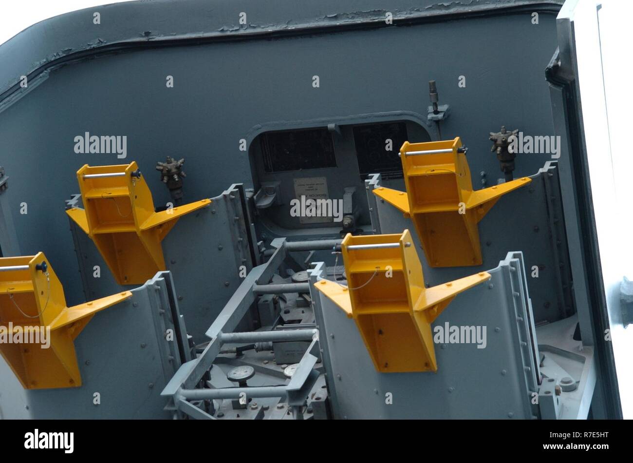 An up-close look at an open Tomahawk cruise missile box launcher aboard the USS Wisconsin (BB 64). The Wisconsin is an Iowa-Class Battleship that is moored permanently next to the Hampton Roads Naval Museum and Nauticus in Downton Norfolk, Virginia as a museum ship. Stock Photo
