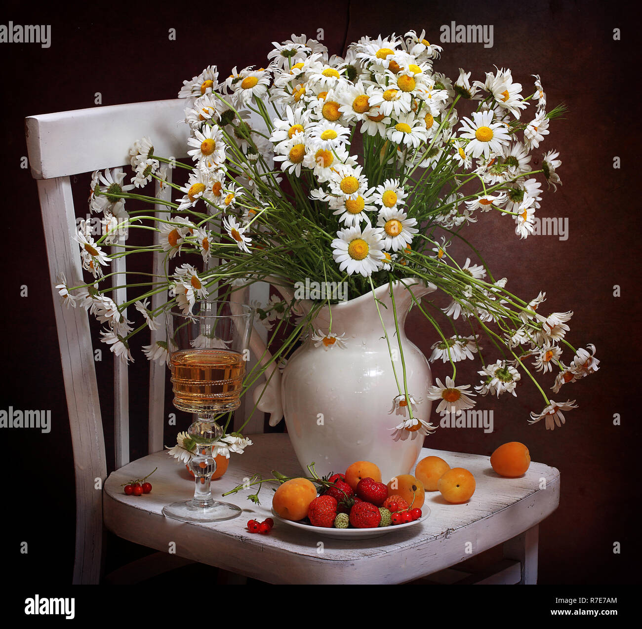 Still life with a bouquet of flowers and wine Stock Photo - Alamy