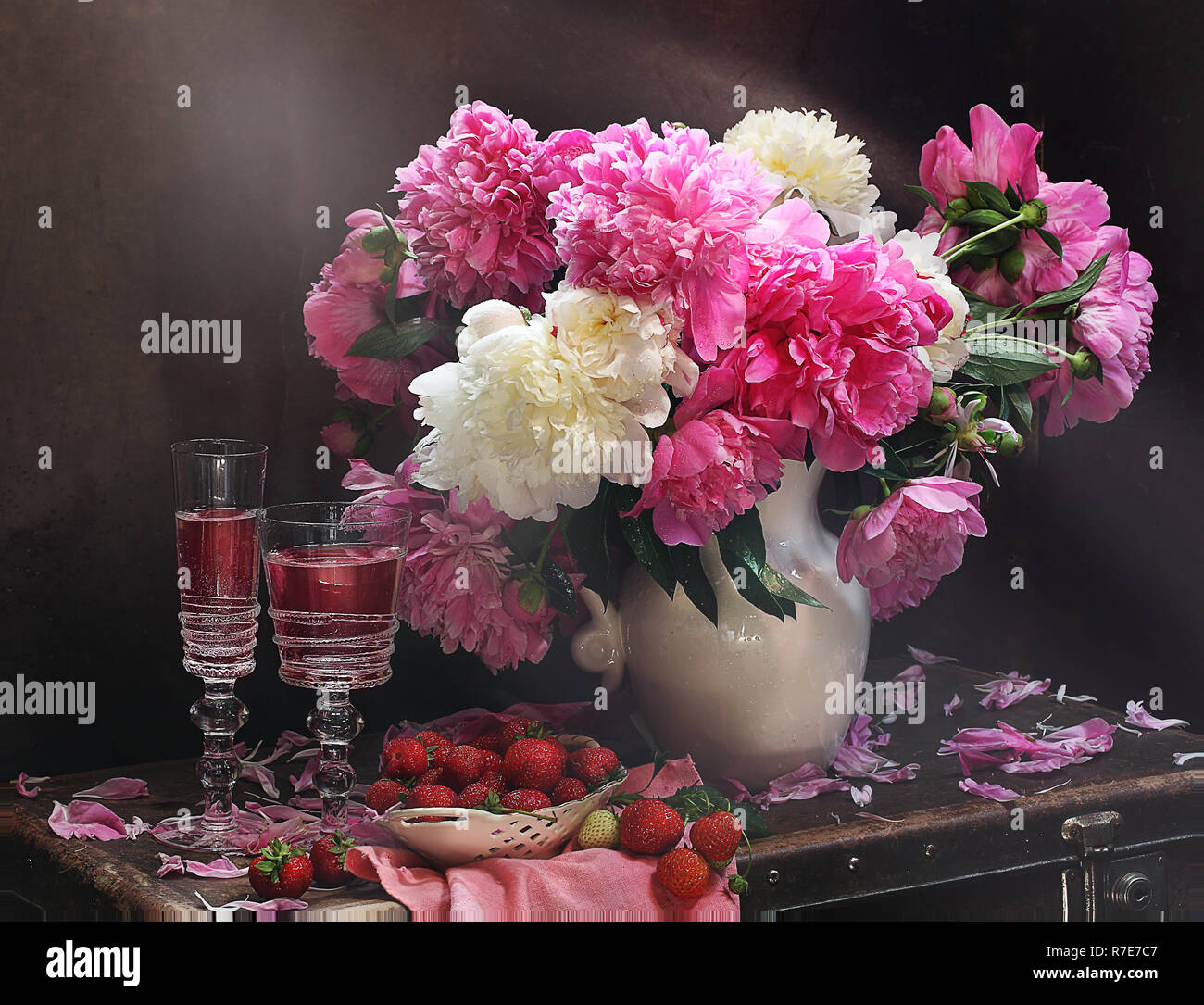 Still Life with peonies, wine and strawberries Stock Photo - Alamy