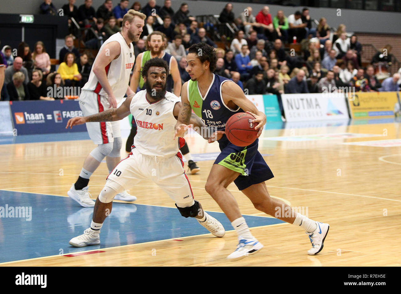 Leeuwarden, Netherlands 08 december 2018 Basketball: Aris Leeuwarden v ZZ Leiden  Jonathan Williams ( Aris Leeuwarden ) en Worthy de Jong ( ZZ Leiden ). Stock Photo