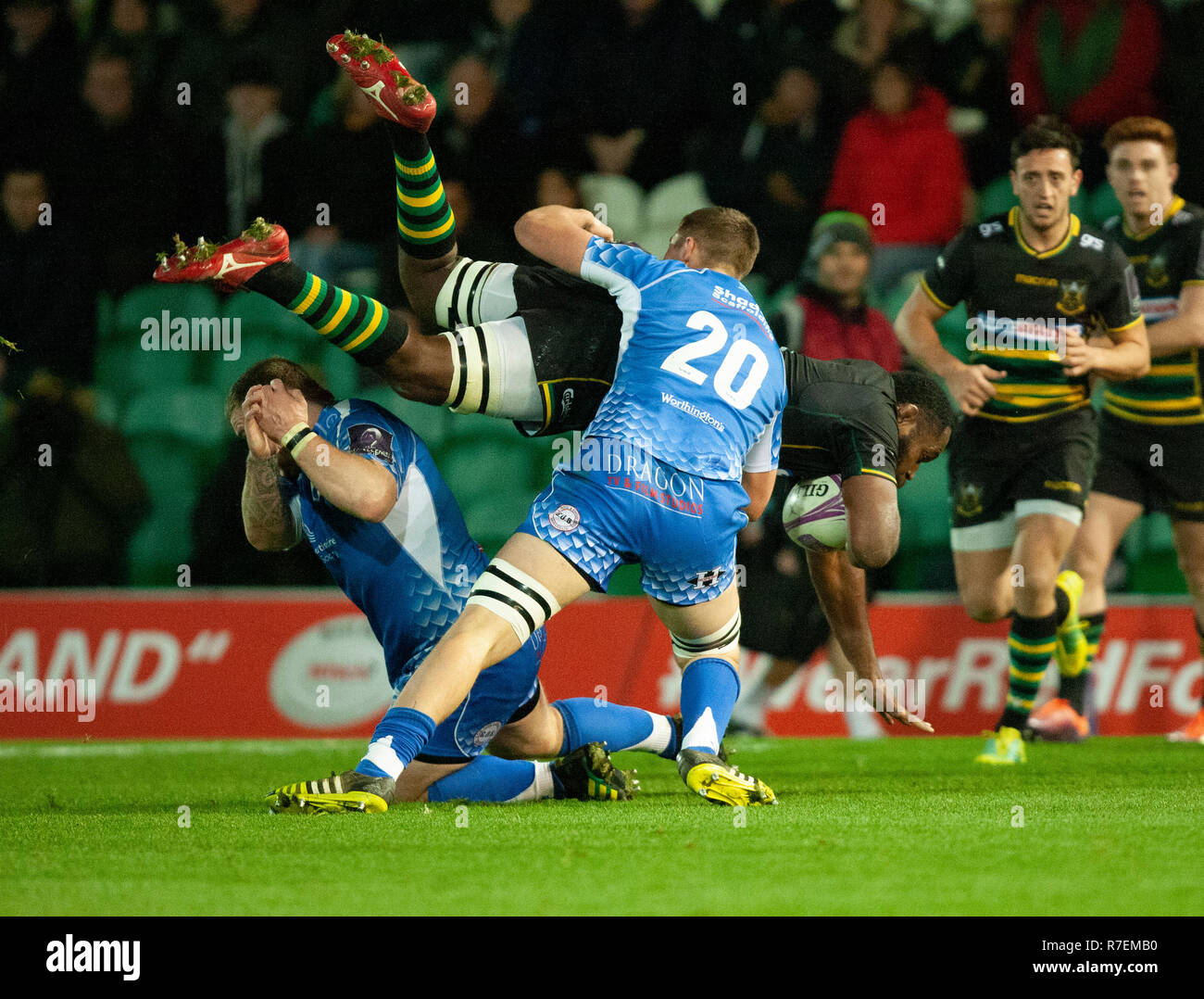 Northampton, UK. 8th December 2018. Api Ratuniyarawa of Northampton Saints is tackled by Huw Taylor during the European Rugby Challenge Cup match between Northampton Saints and Dragons. Andrew Taylor/Alamy Live News Stock Photo