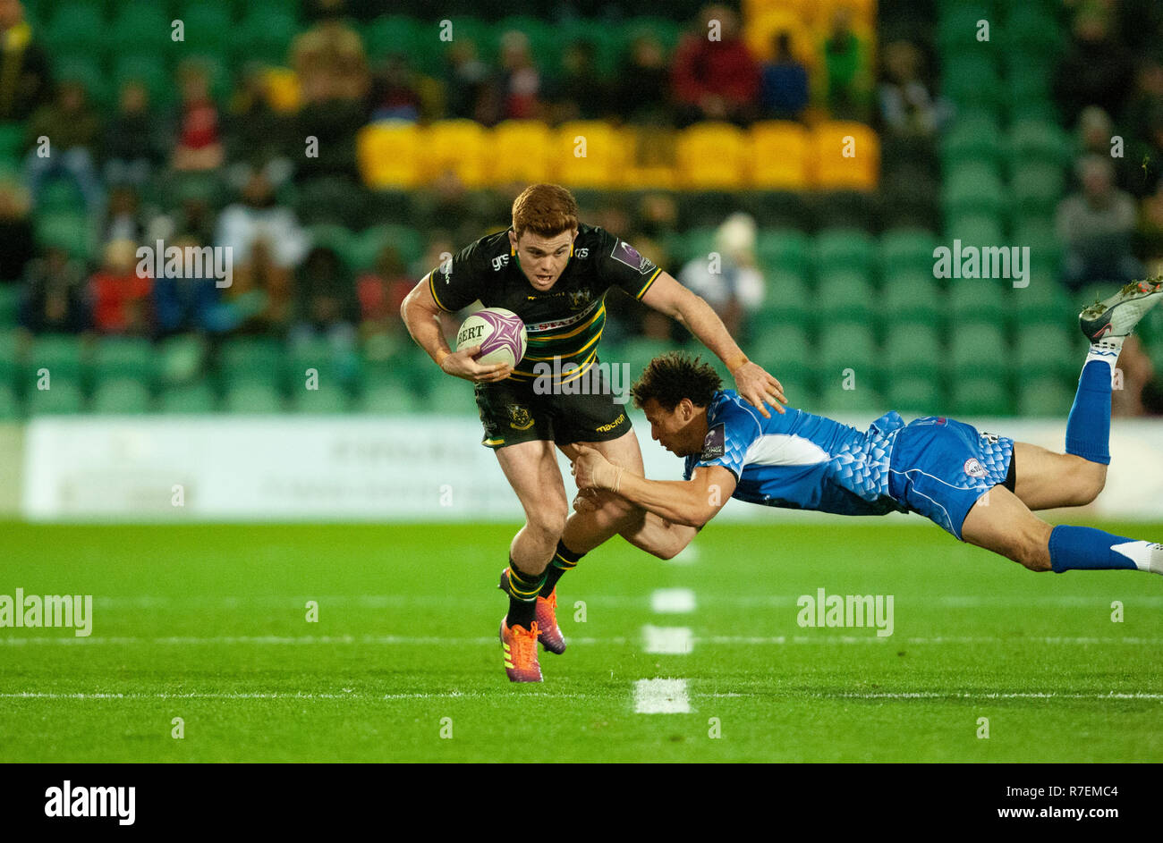 Northampton, UK. 8th December 2018. Andrew Kellaway of Northampton Saints is tackled by Zane Kirchner during the European Rugby Challenge Cup match between Northampton Saints and Dragons. Andrew Taylor/Alamy Live News Stock Photo