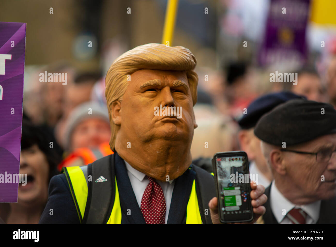 Brexit Betrayal march. Protesters are demonstrating at what they see as a betrayal by the UK government in not following through with leaving the EU in its entirety after the referendum. Donald Trump mask Stock Photo