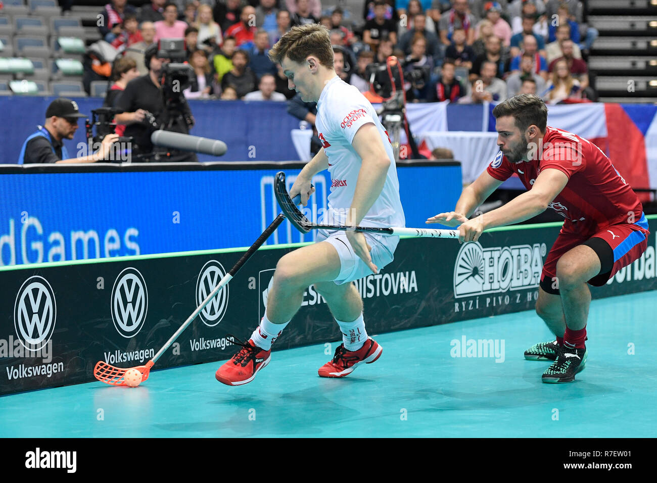 Prague, Czech Republic. 09th Dec, 2018. L-R Jan Burki (SUI) and Tom Ondrusek (CZE) in action during the Men's World Floorball Championships match for third place Czech Republic vs Switzerland, played in Prague, Czech Republic, on December 9, 2018. Credit: Ondrej Deml/CTK Photo/Alamy Live News Stock Photo