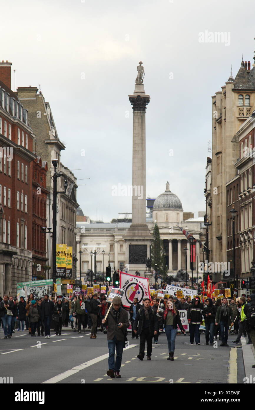 London, UK, 9th December 2018. A demonstration that organisers described as being for all anti-fascists, regardless of their positions on leave/remain on Brexit, opposes 'Tommy Robinson, fascism and racism.   The march from the BBC, Portland Place to Whitehall is a counter protest against one called by Robinson and UKIP. Roland Ravenhill / Alamy Live News Stock Photo