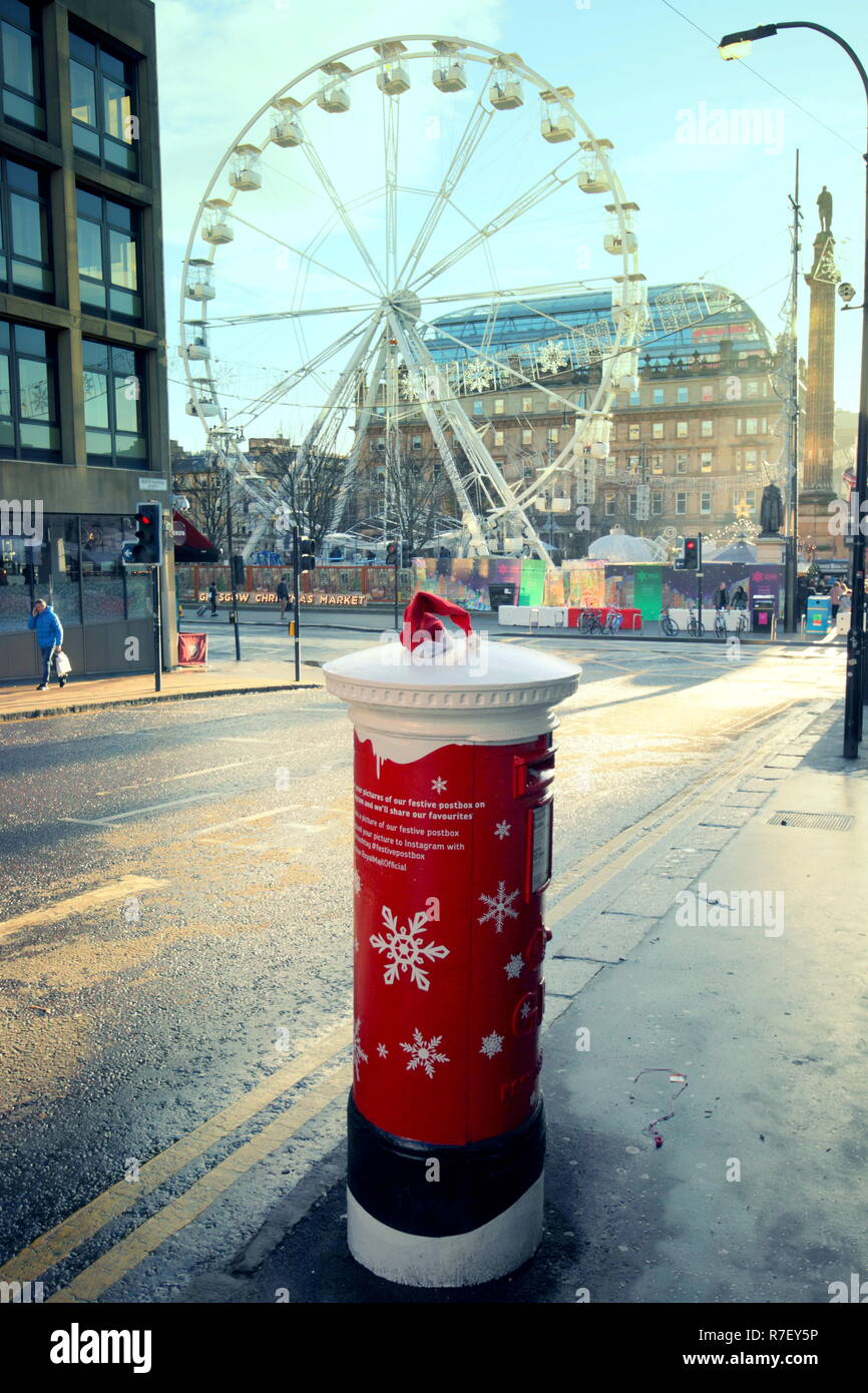 Glasgow, Scotland, UK, 9th December. Santa Dash Sunday saw the start and finish in the centre of the city in George square as the post office have a musical post box that found a discarded Santa hat outside the queen street rail station. Credit Gerard Ferry/Alamy news Stock Photo