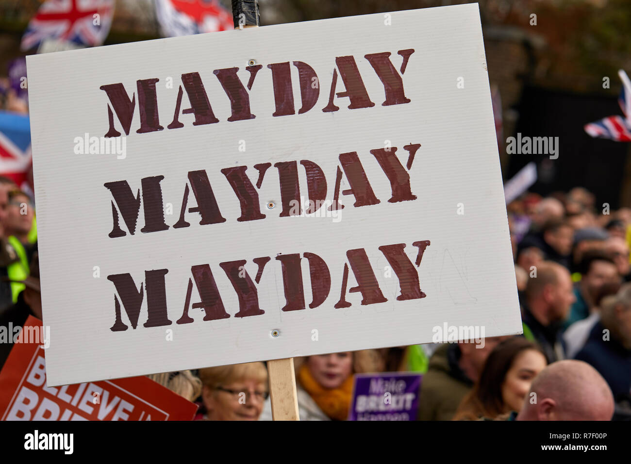 London, UK. 9th December 2018. A placard, critical of Prime Minsiter Theresa May held aloft during the Brexit Betrayal March and Rally through London. Credit: Kevin J. Frost/Alamy Live News Stock Photo